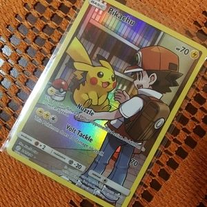 Pikachu and Ash TCG